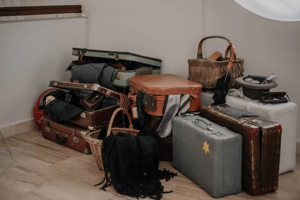 Hotel bellhop helping with luggage