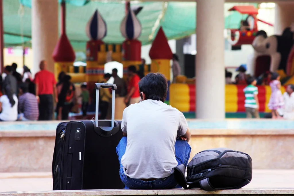 bags, black, person, sitting, view, bag, close, traveller, waiting, luggage, luggage, luggage, luggage, luggage, luggage