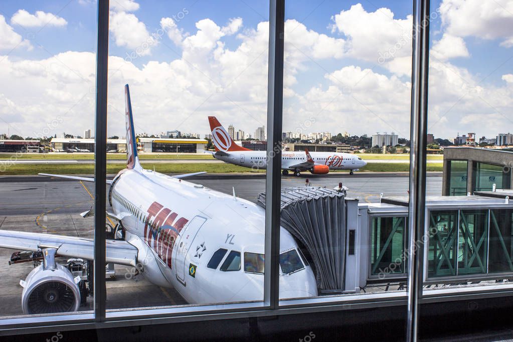 Sao Paulo, Brazil, February 25, 2013. Airplane is seen on the runway from the departure lounge of Congonhas Airport in Sao Paulo