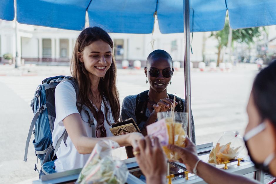 young traveler buying prepaid SIM in Brazil