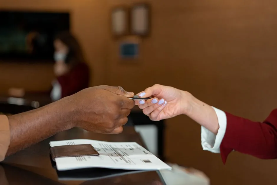 person handing documents consulate counter in Brazil