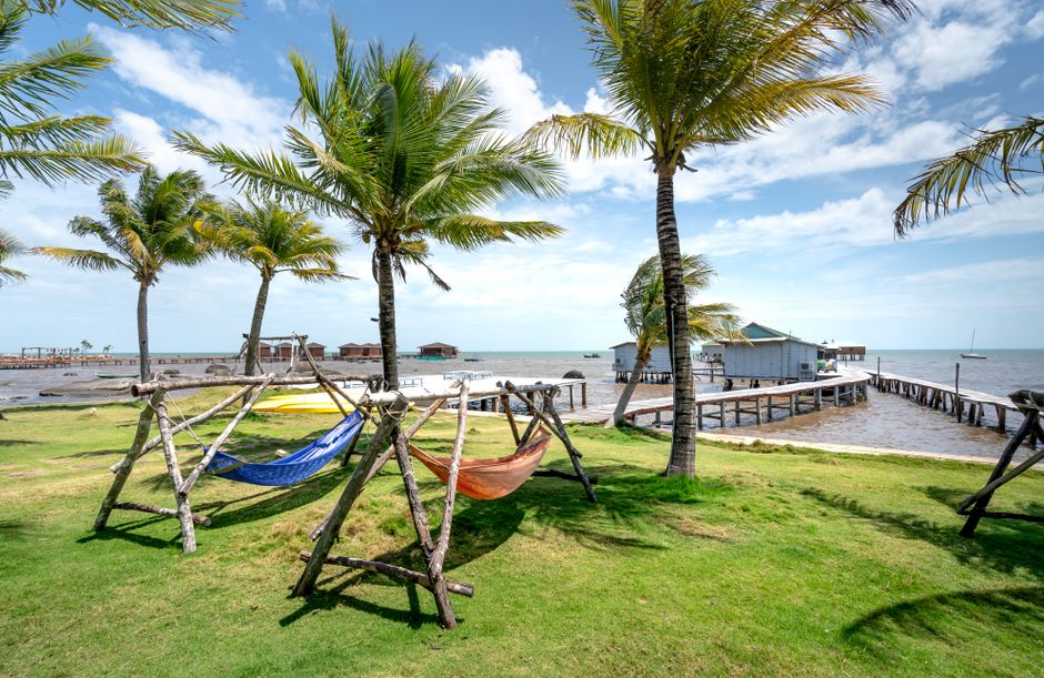 colorful beachfront bar with hammocks in Brazil