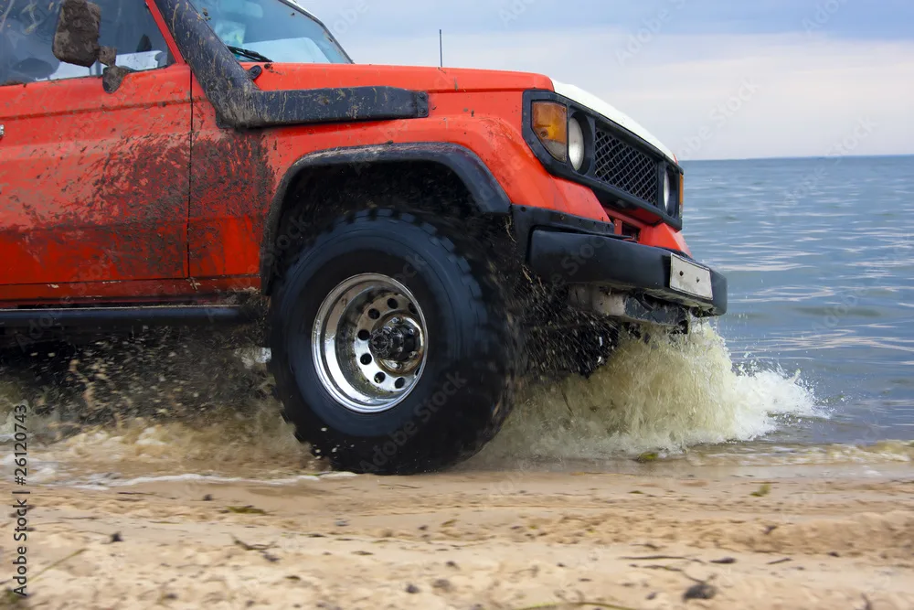 4x4 crossing red mud track in Brazil