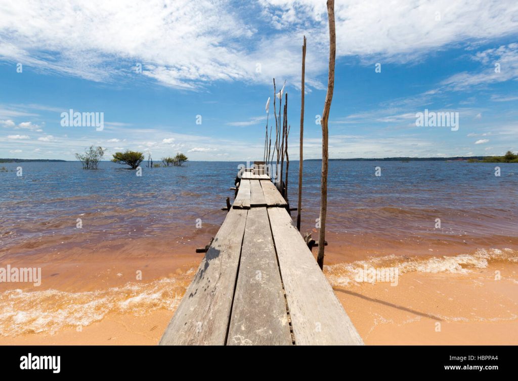 Amazon river dusk wooden pier in Brazil