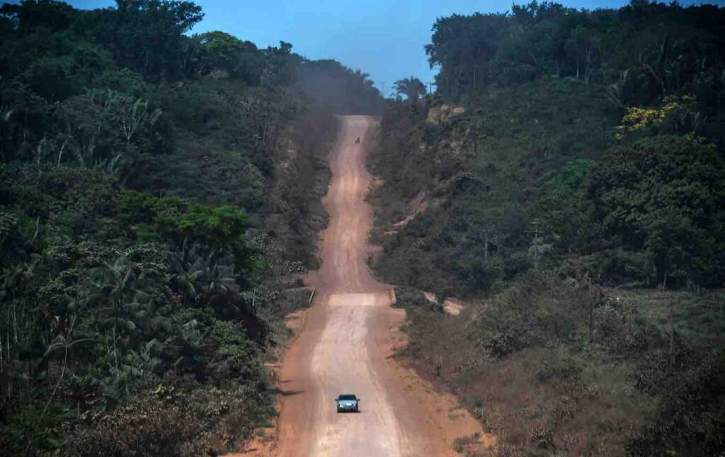 car driving along coastal highway in Brazil