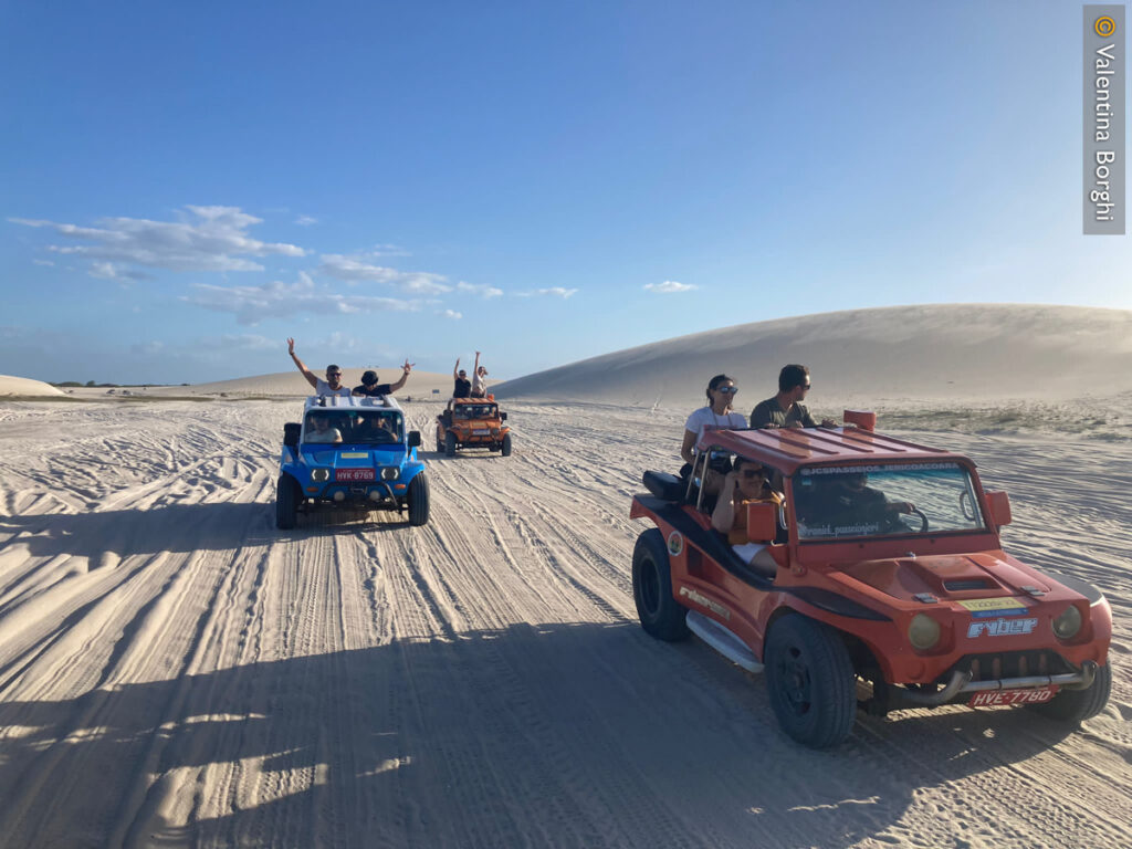 dune buggy reaching ocean dune in Brazil